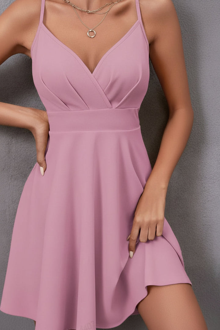 Women's elegant backless party dress, a stylish sleeveless mini dress for summer evenings.