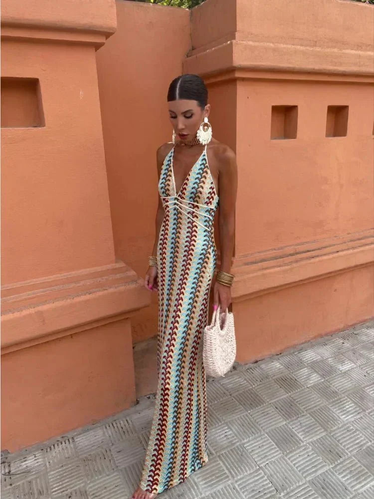 Bohemian printed maxi halter dress with open back, perfect for wedding guests & summer parties.