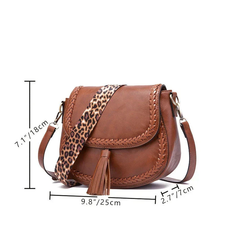 Everyday elegant brown shoulder bag for women, a stylish saddle bag with a chic tassel.