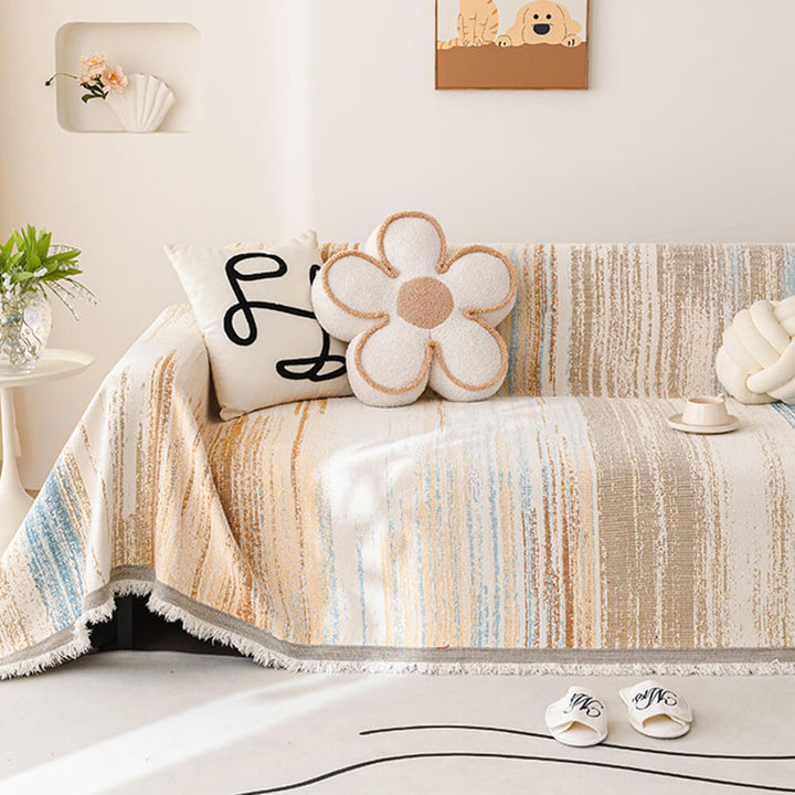 Jacquard chenille couch throw with fringe, ombre pattern, adds texture to living room furniture