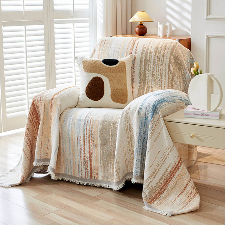 Textured chenille couch cover with fringe, ombre jacquard, perfect for furniture protection