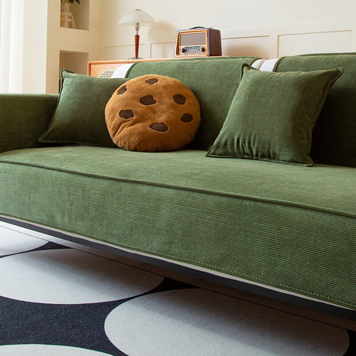 Chic corduroy sofa protector in a stylish beige, anti-slip design for pet-friendly home decor