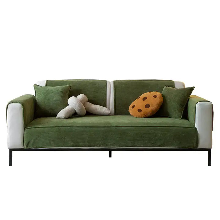 Full view of an cream corduroy sofa protector, an anti-slip solution for pet-friendly home decor