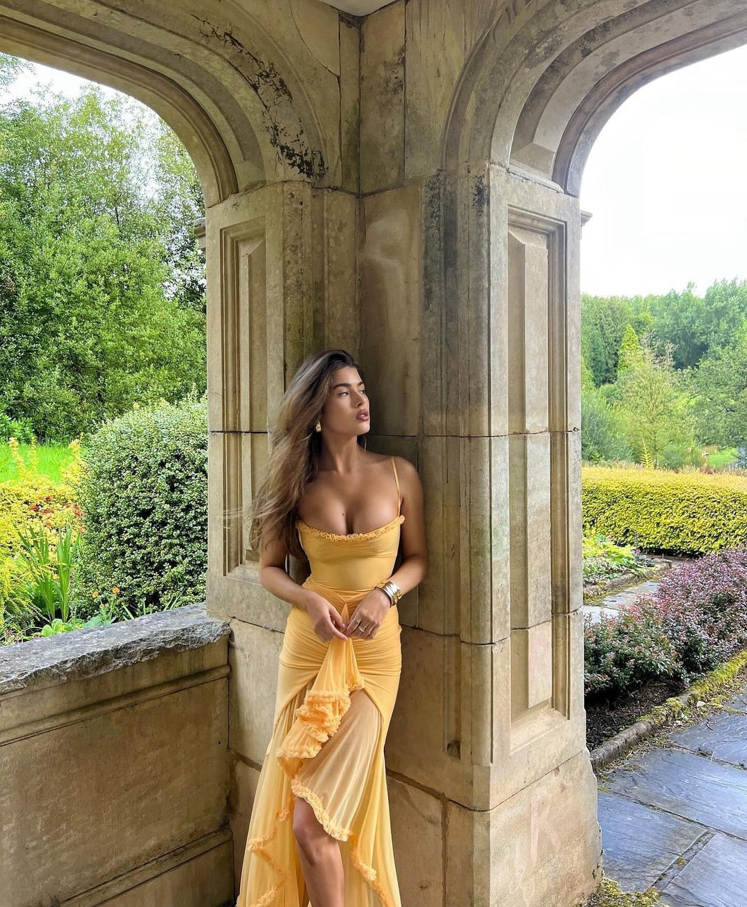 Women's beautiful sweetheart neck ruffle maxi dress. A stunning wedding guest dress for elegant events.