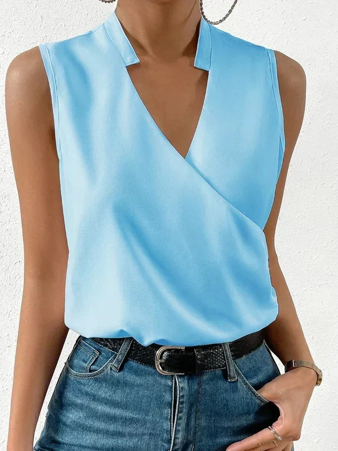 Relaxed fit women's sleeveless wrap top with a flattering V-neck, great for everyday style.