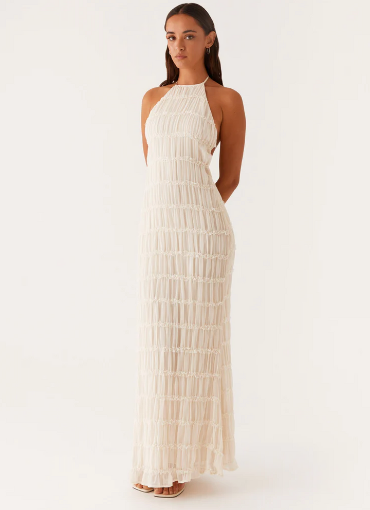 Chic textured halter maxi wedding guest dress for women. Elegant formal wear.
