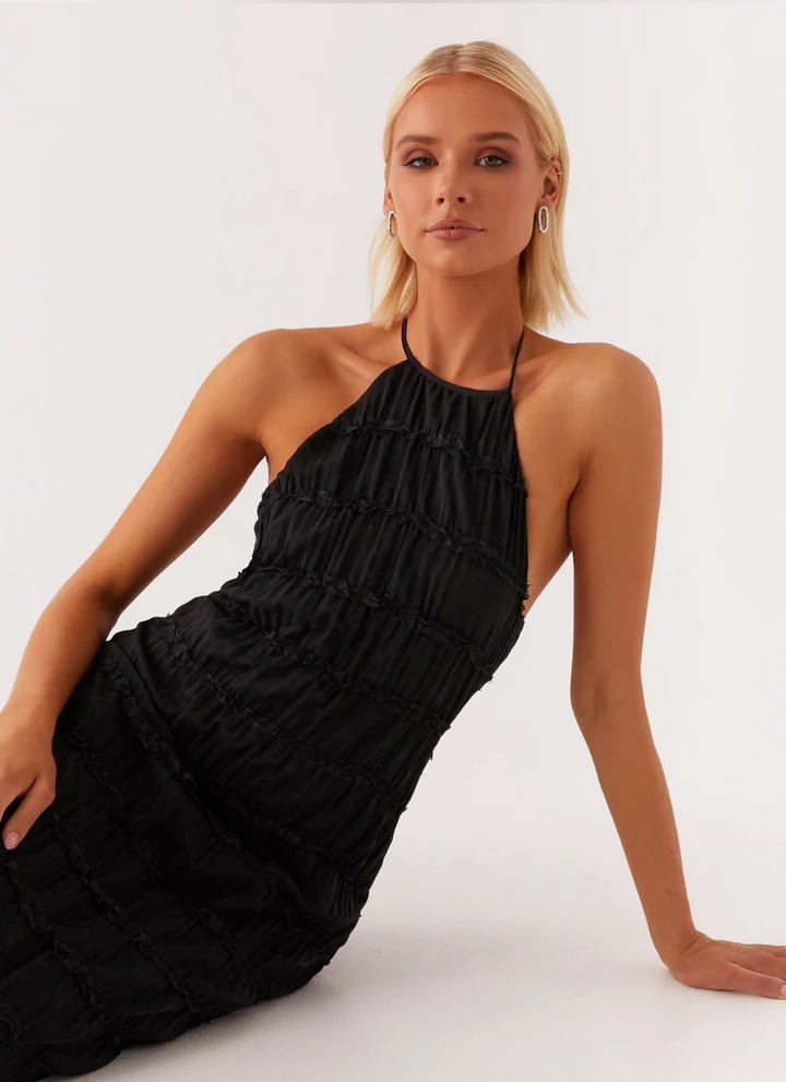 Blue textured halter maxi dress, a chic & comfortable option for wedding guests.
