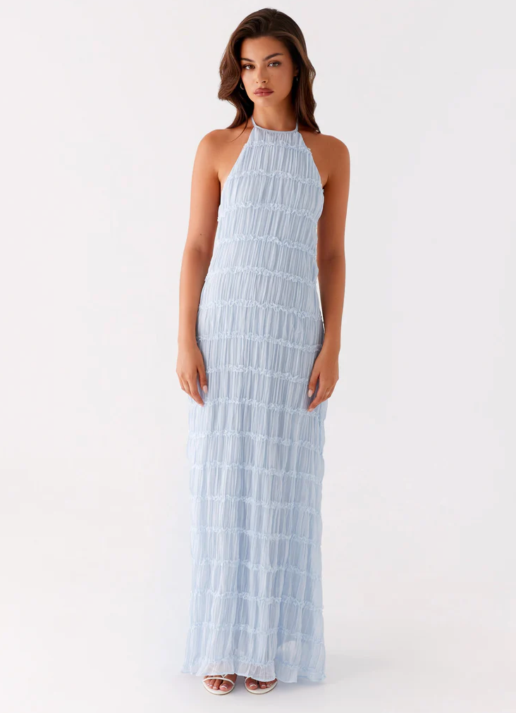 Formal blue textured column maxi dress with a chic halter neckline for special occasions.