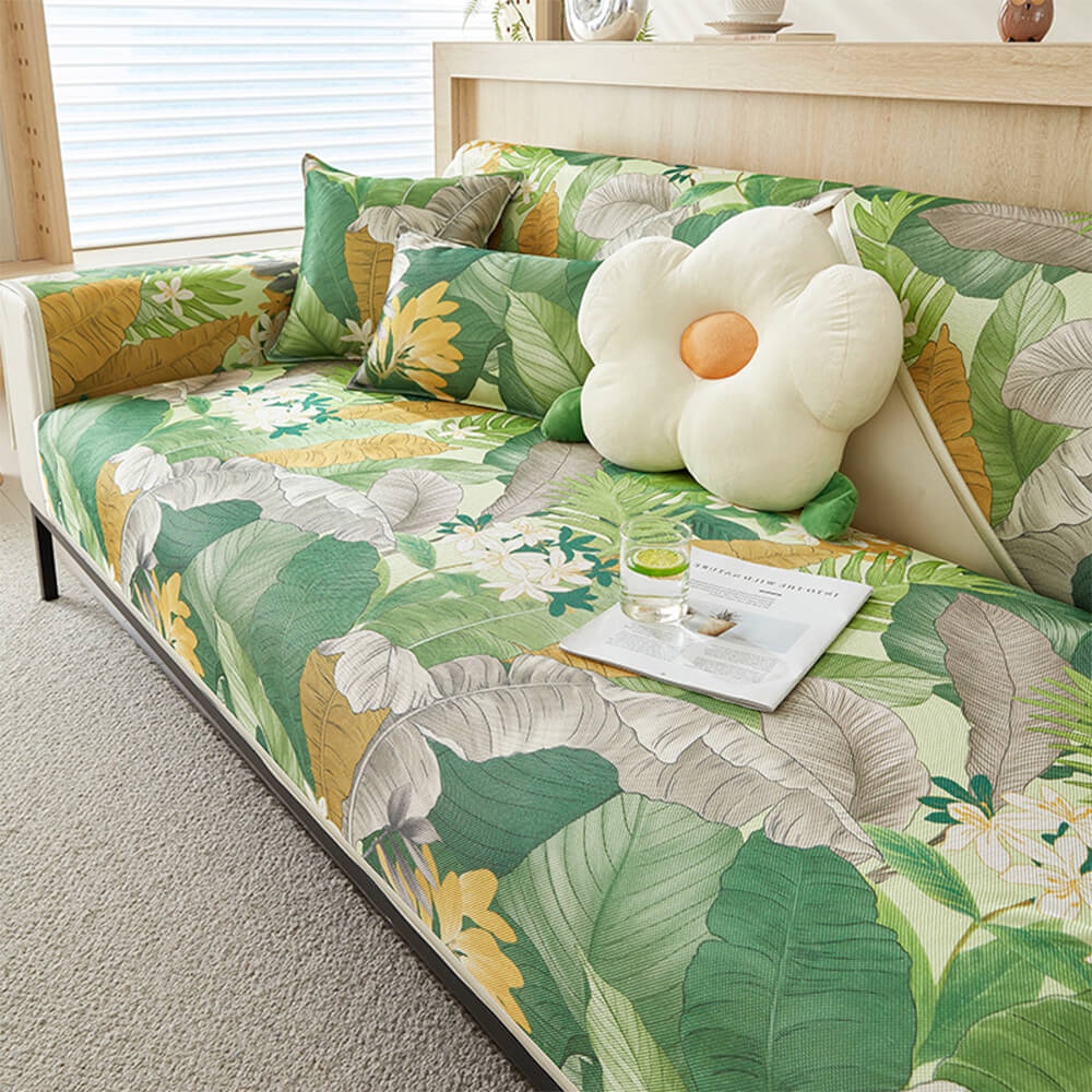 Cooling ice silk sectional sofa cover with elegant tropical leaf print, non-slip furniture protection