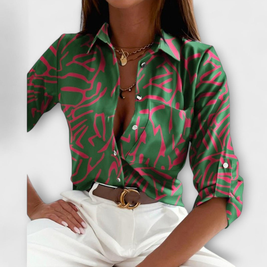 Trendy women's abstract pattern button-down blouse. Relaxed fit long sleeve shirt.