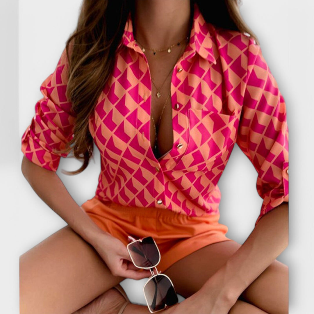 Modern abstract print button down blouse for women. Elegant long sleeve top, perfect for any occasion.