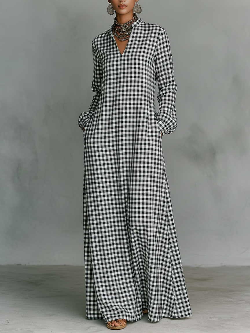 Chic women's black & white gingham check maxi dress with a flattering v-neck and long sleeves, perfect for spring.