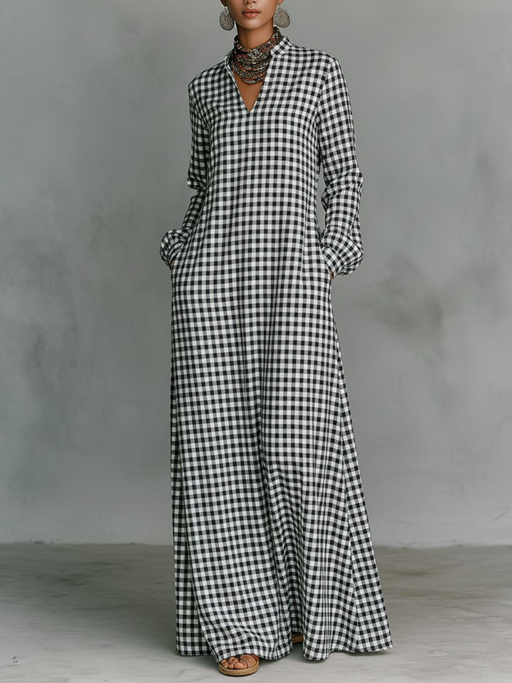 Chic women's black & white gingham check maxi dress with a flattering v-neck and long sleeves, perfect for spring.