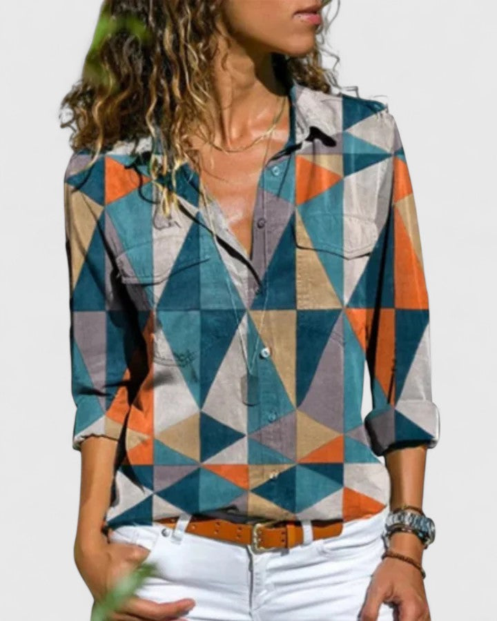 Comfortable women's blouse with chic style. Elegant fashion top for versatile summer and casual wear.