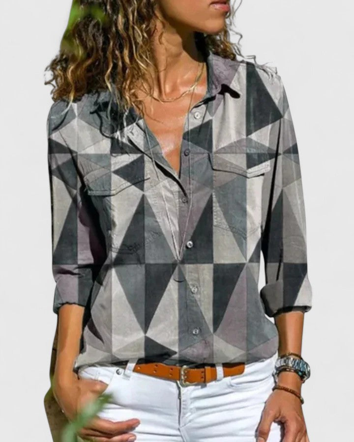 Fashionable women's chic blouse in a light fabric, offering versatile style and comfort for any occasion.