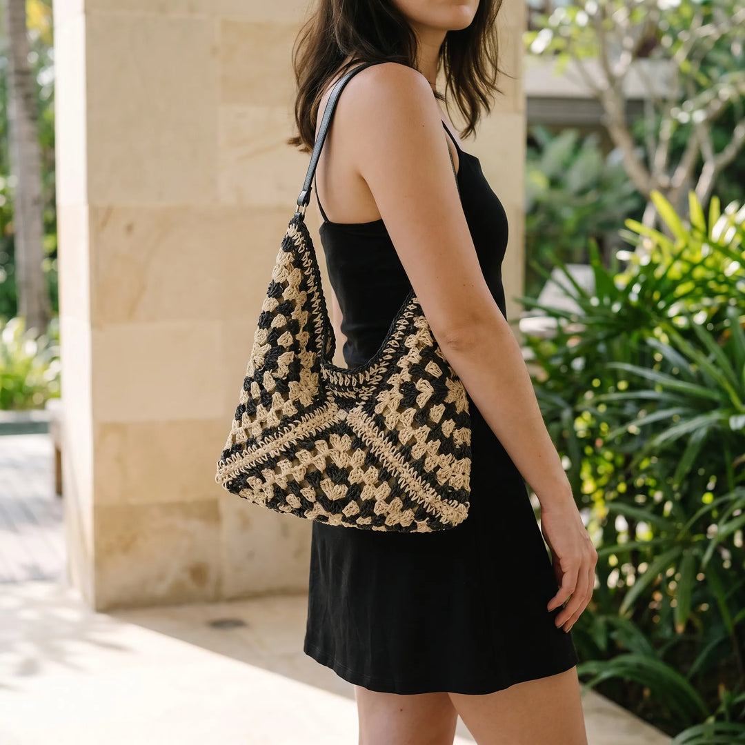 Chic women's casual tote bag with open top. Perfect shoulder bag for summer, travel, and everyday effortless style.