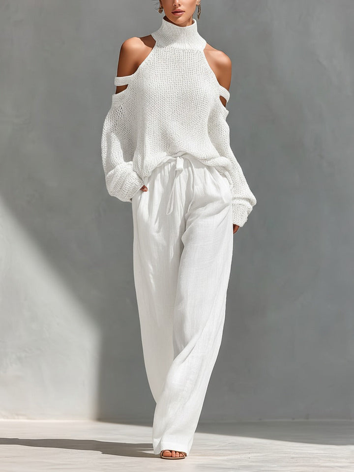 Stylish women's cold shoulder top and wide leg pant two-piece set. Elegant summer outfit, ideal for resort wear.