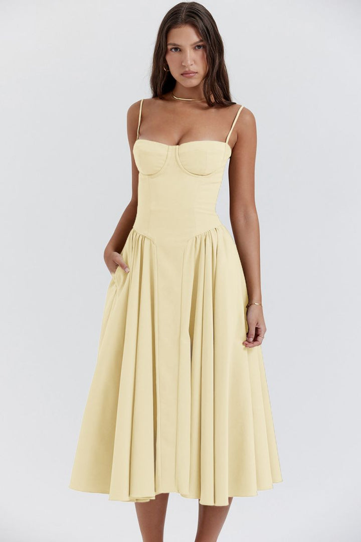 Chic women's corset midi A-line wedding guest dress. Elegant, flattering, and perfect for special occasions.