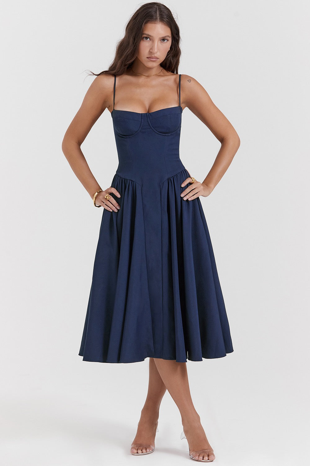 Flattering A-line midi dress with corset bodice & spaghetti straps. A chic choice for wedding guests & parties.