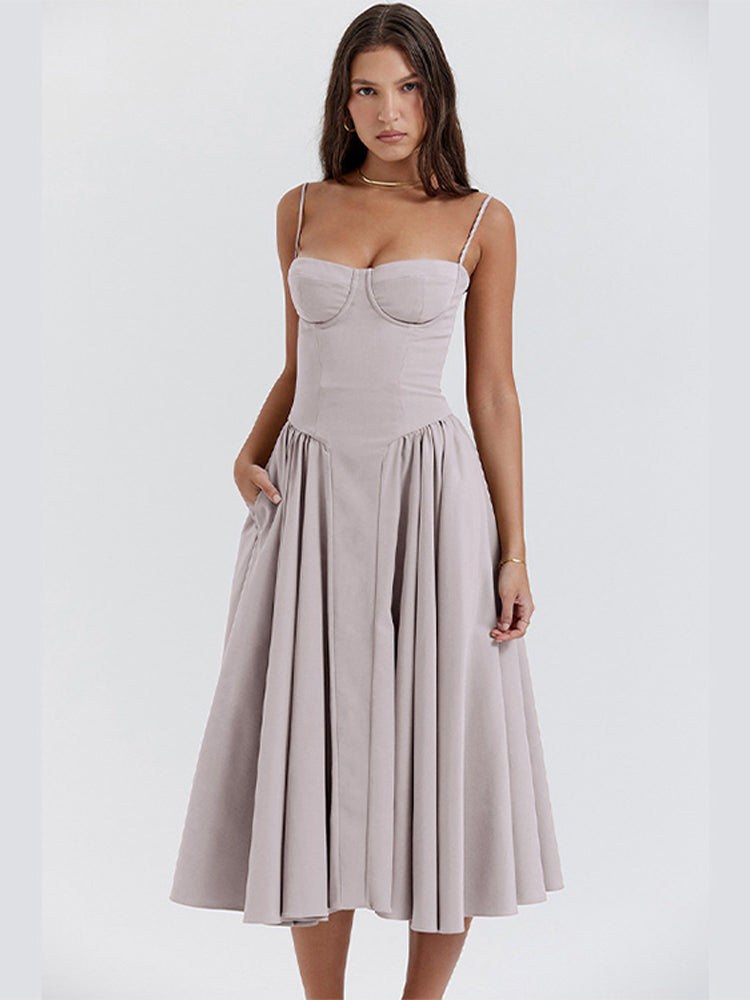Summer-ready A-line midi wedding guest dress with corset detail. Sleeveless, comfortable, and elegant.