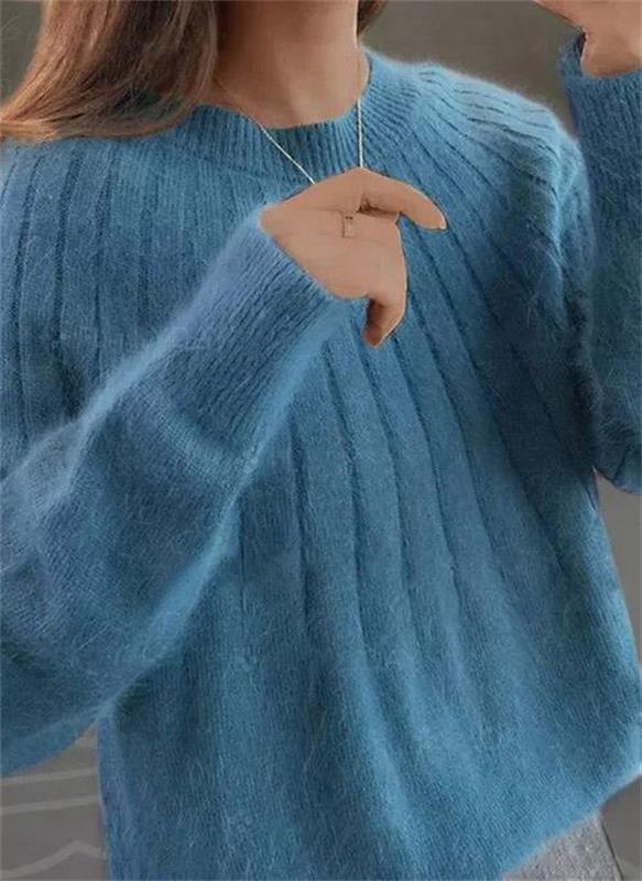 Chic women's cozy textured knit sweater in a soft pullover style, perfect for fall and winter comfort.