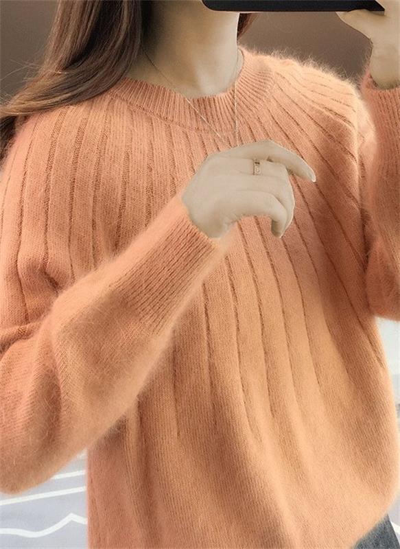 Soft & plush women's textured knit sweater. A comfortable, chic longsleeve pullover for cozy winter fashion.