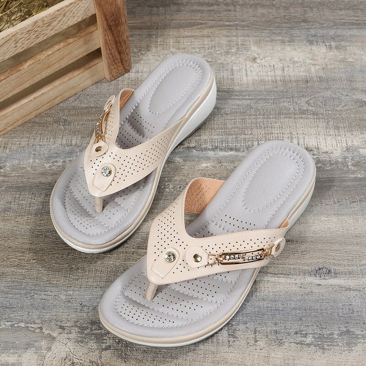 Women's comfortable cushioned flip flop sandals, ideal for beach, summer, or casual wear. Stylish decorative strap.