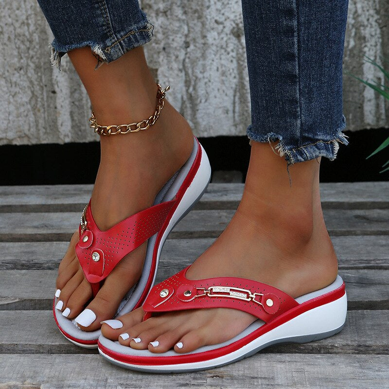 Soft women's cushioned flip flop sandals for ultimate comfort. Decorative strap adds a chic touch for summer beach style.