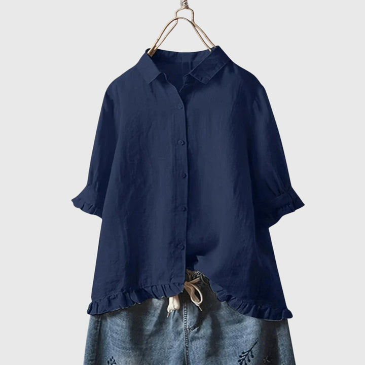 Elegant women's long-sleeve blouse, perfect for spring outfits. Stylish and comfortable everyday top for chic fashion.