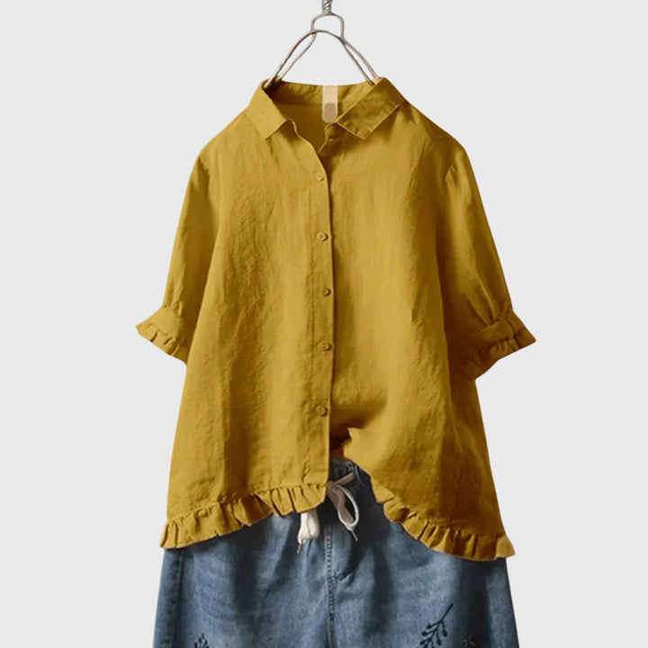 Stylish women's long-sleeve top, a chic and versatile blouse for everyday apparel. Elegant fashion for any occasion.