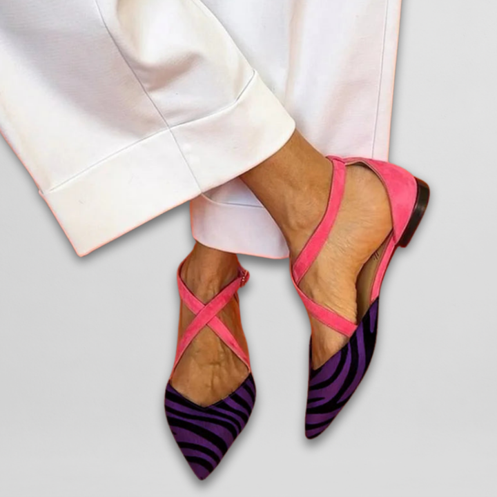 Zebra print women's strappy flats. Fashionable and comfortable ballerinas, ideal for elegant summer style.