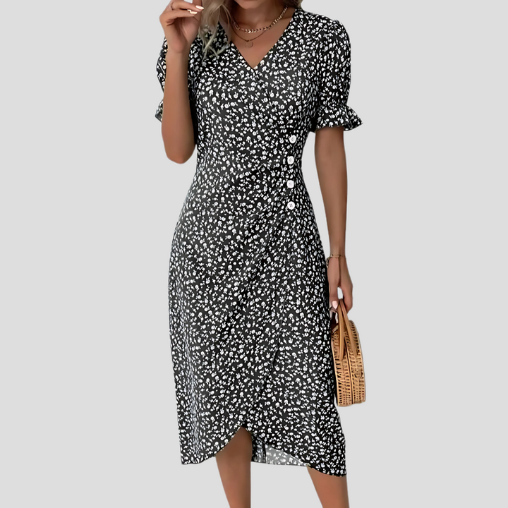Elegant puff sleeve floral midi dress for women, featuring a stylish button front. Ideal for casual wear.