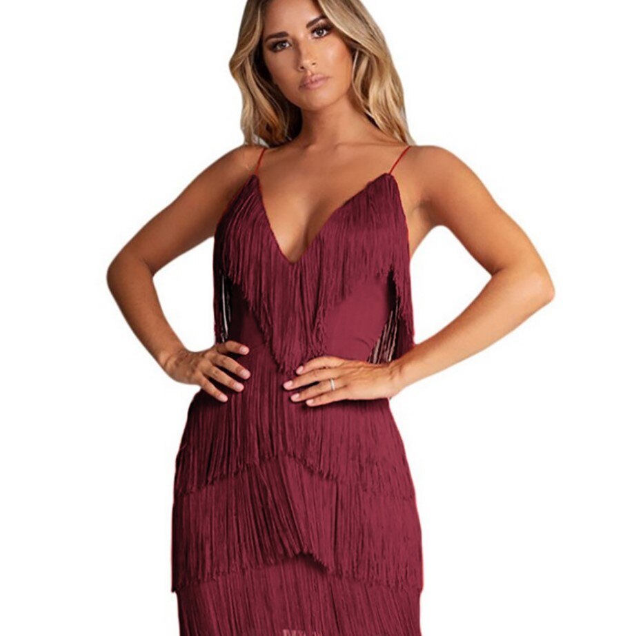 Chic women's fringe mini dress, perfect for parties & clubwear. Flattering sleeveless design in a vibrant color.