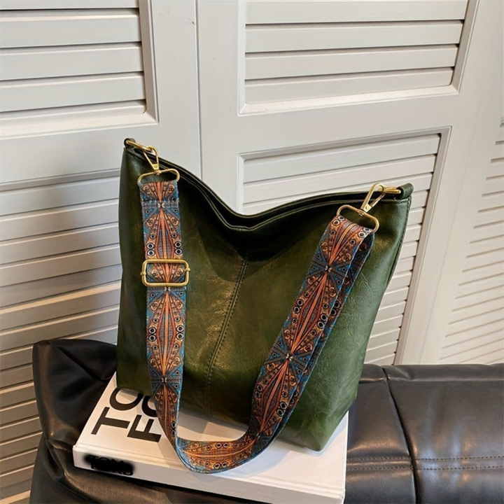 Retro chic geometric print shoulder bag for women. Stylish everyday handbag, a versatile fashion accessory.