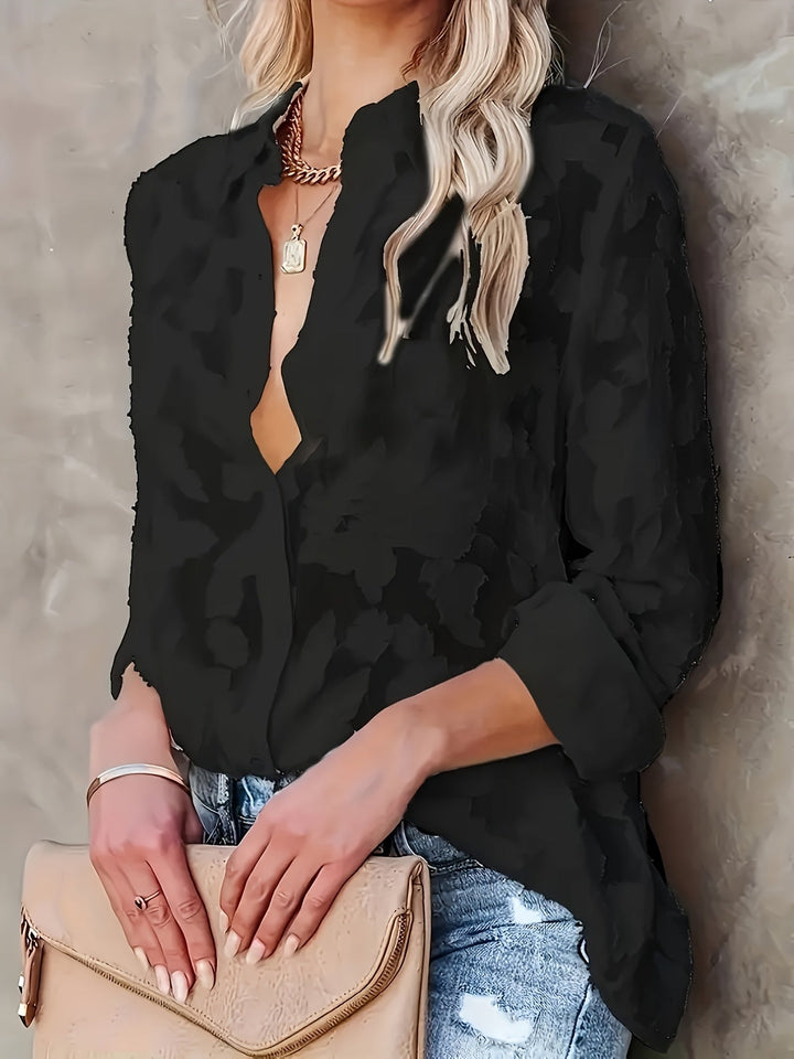 Elegant women's flowing V-neck jacquard blouse. Chic fashion top suitable for work, casual, or evening.