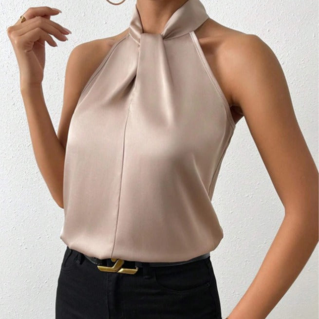 Chic women's knot neck halter top, sleeveless and elegant for versatile summer style.