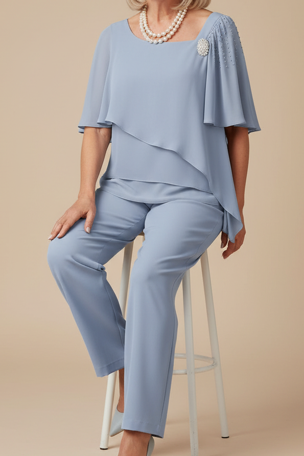 Chic women's light blue two-piece lounge set. Relaxed fit matching top & shorts, perfect casual summer outfit.