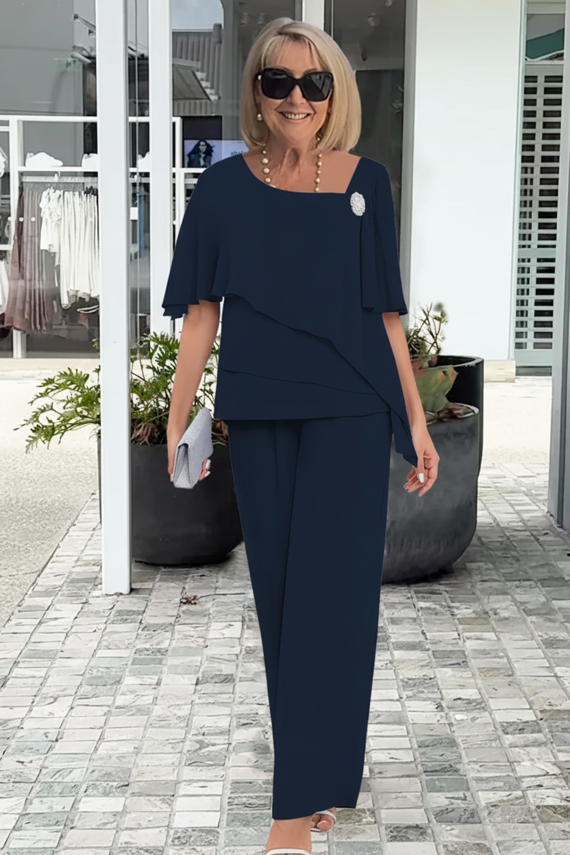 Women's navy blue two-piece set, a comfortable casual outfit. Relaxed fit lounge top & shorts for everyday wear.