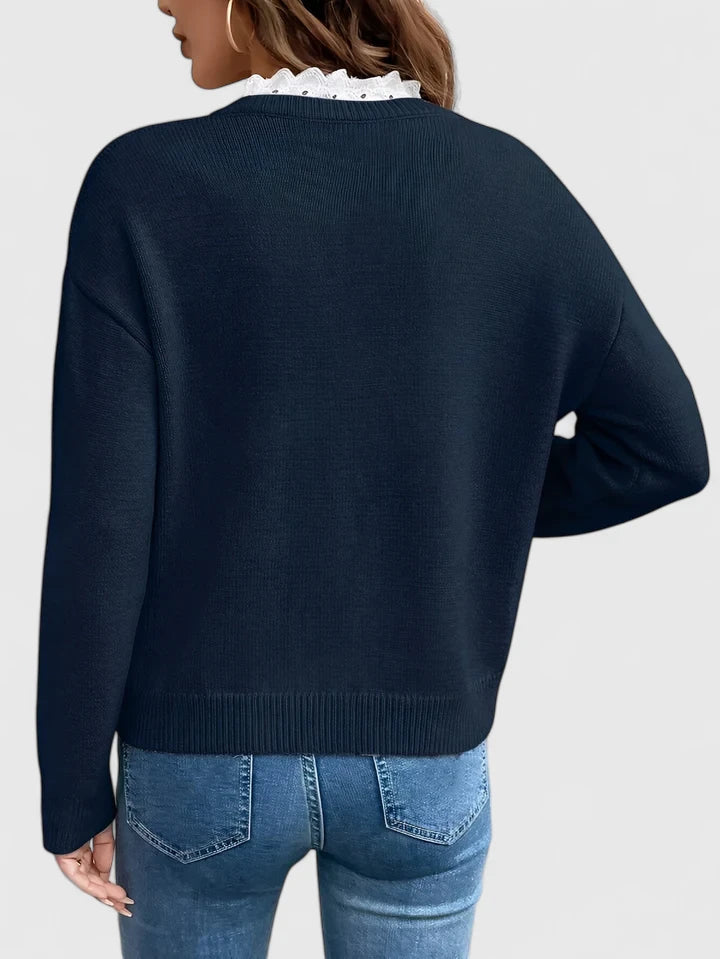 Women's chic long sleeve blouse. Elegant and comfortable top ideal for versatile office or casual wear.