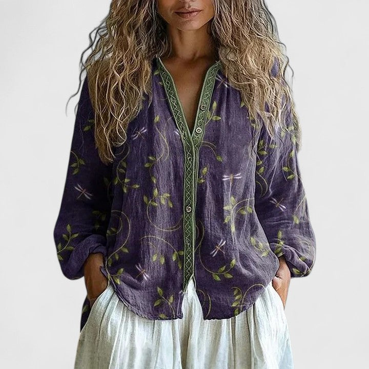 Chic women's long sleeve blouse with elegant leaf print, perfect for office or casual fashion.