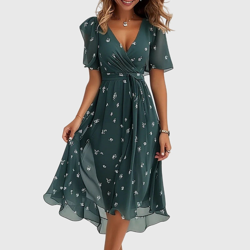 Flattering fit flowy midi dress for women. Comfortable & chic, ideal for casual summer days or elegant evenings.