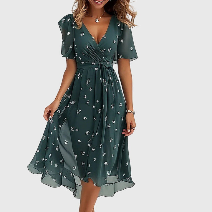Elegant women's midi dress. Chic, comfortable, and flattering, perfect for summer casual or evening fashion.