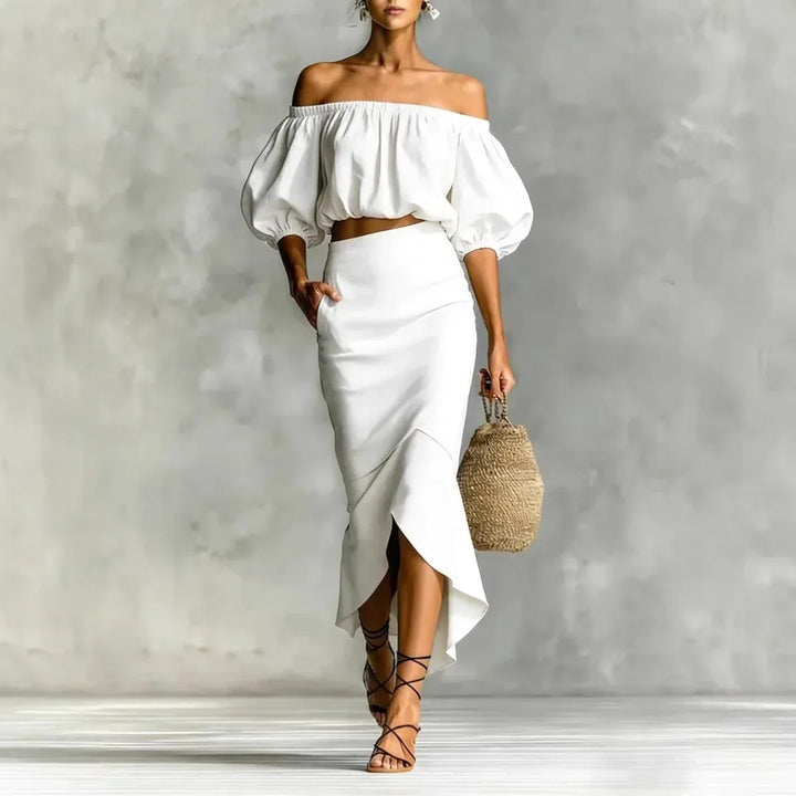 Elegant women's off-shoulder puff sleeve top & wrap midi skirt set, ideal for brunch, vacation, or summer fashion.