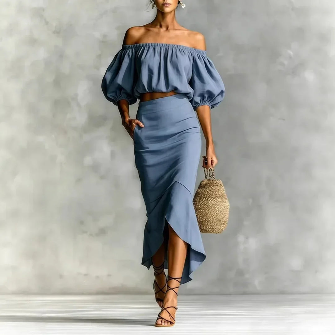 Stylish two-piece women's off-shoulder puff sleeve top and flowy midi skirt set, great for an elegant summer look.