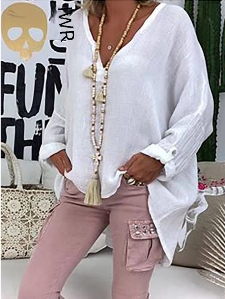 Effortless women's summer blouse, a comfortable oversized top for versatile daily wear.