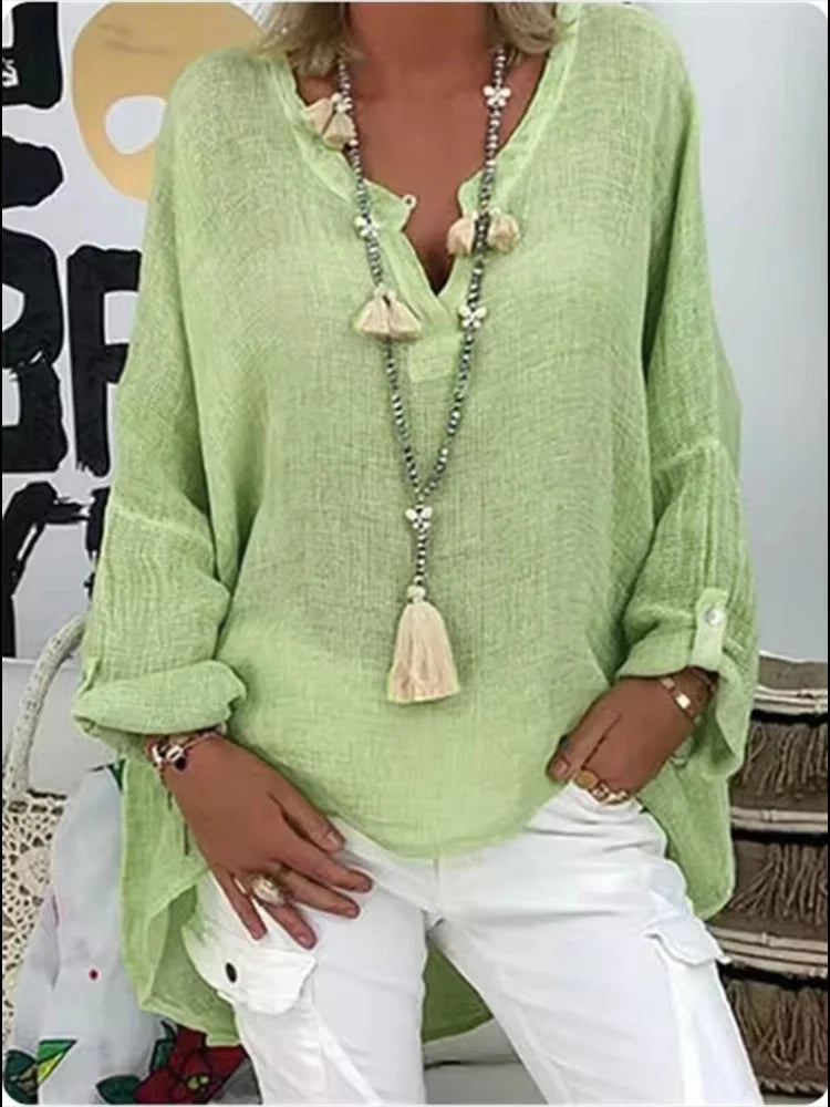 Stylish women's oversized top, a flowy tunic perfect as a chic beach cover-up or casual wear.