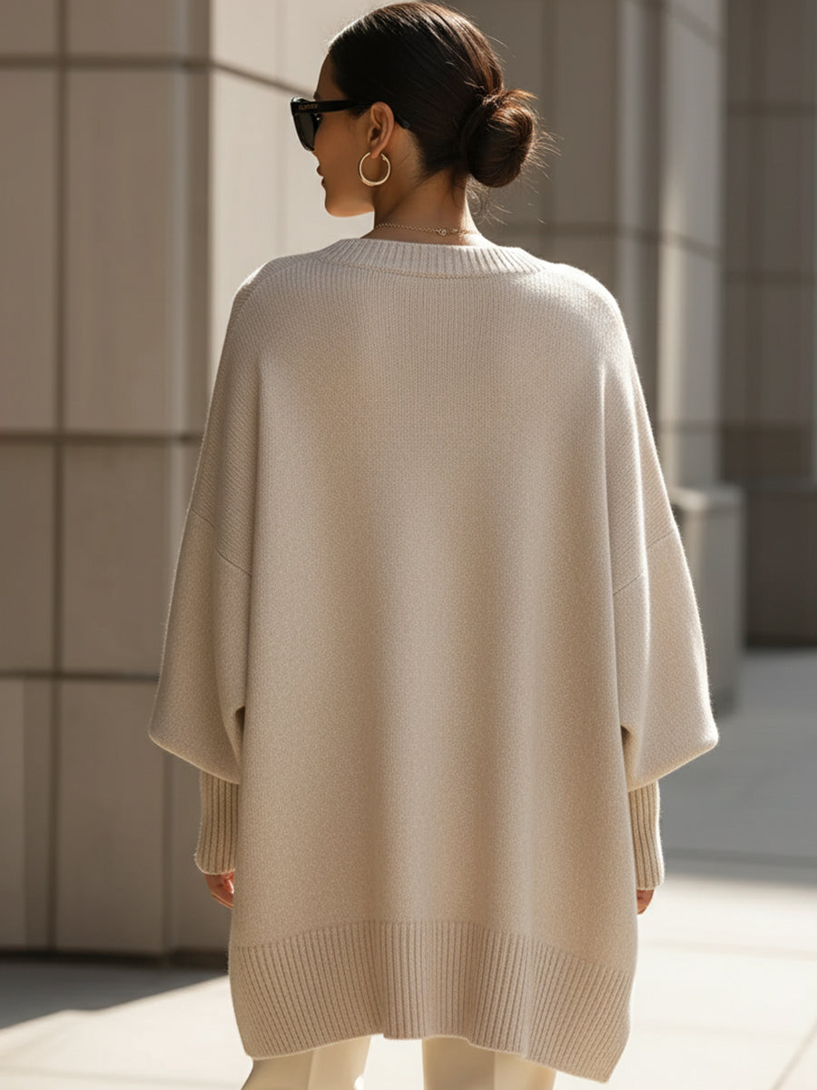 Comfortable women's oversized sweater. Stylish knit top for everyday elegance & relaxed wear.