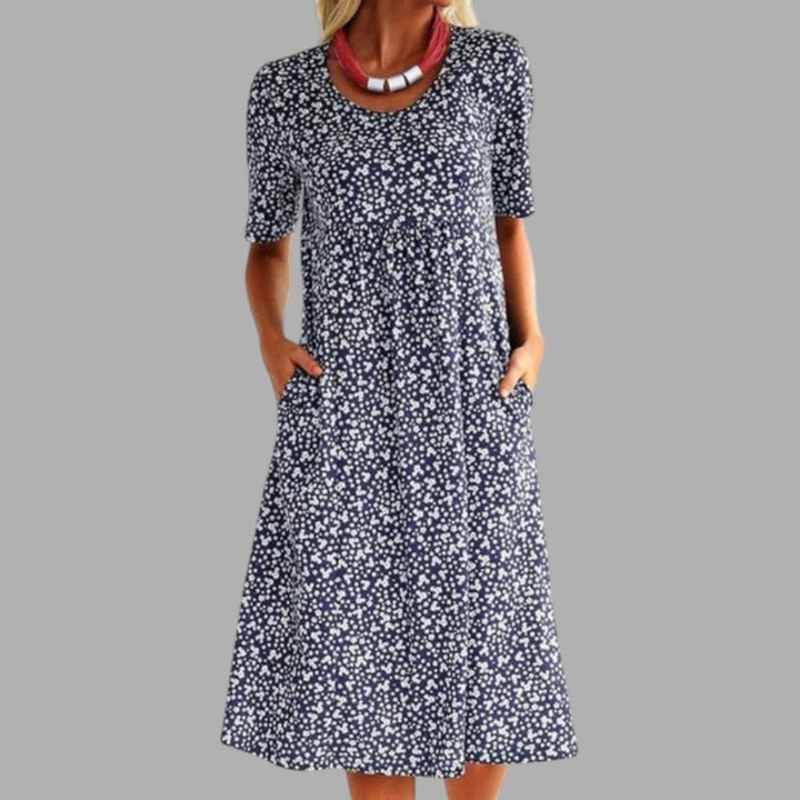 Chic women's printed midi dress, perfect for casual spring days or elegant summer parties. Flowy & comfortable.