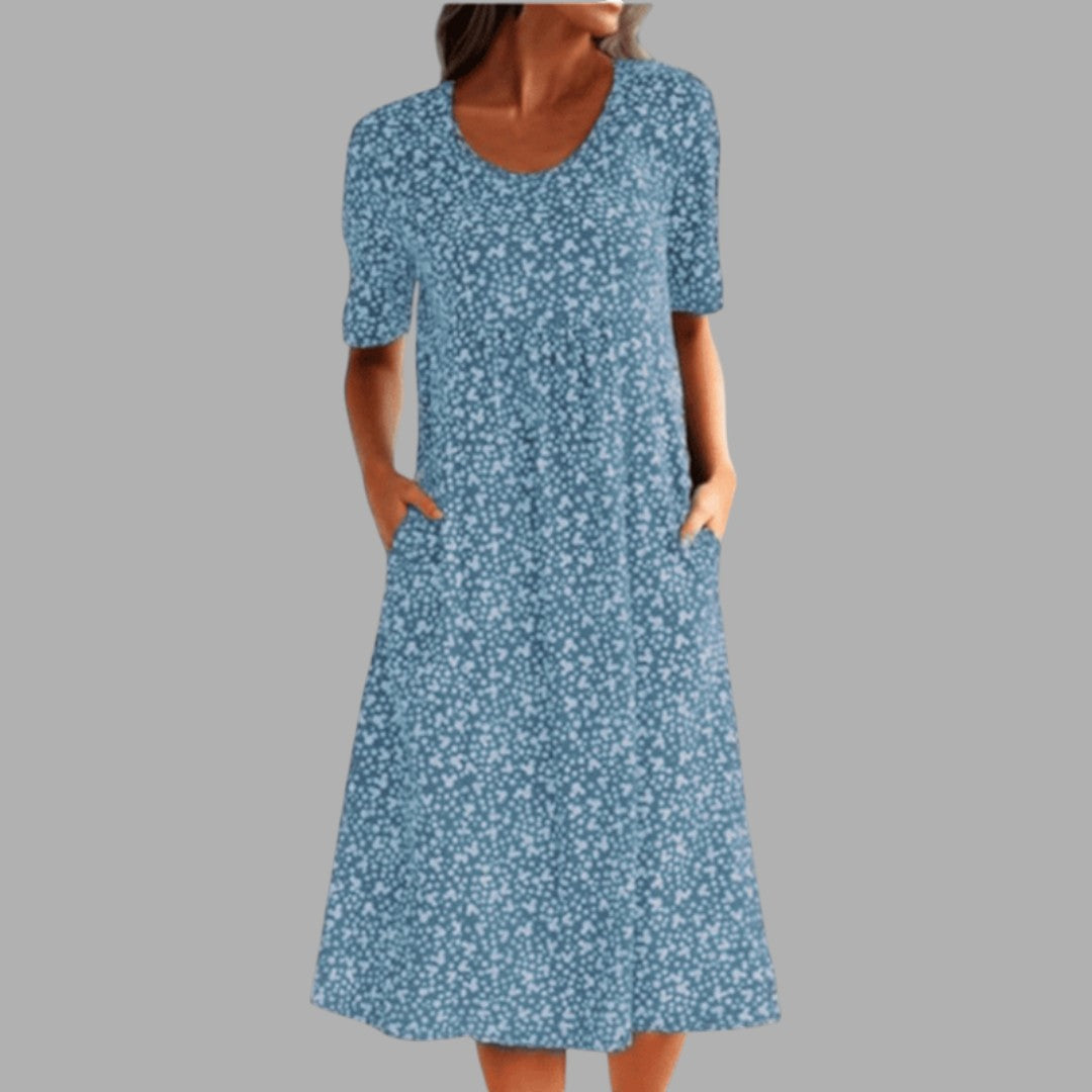 Comfortable women's midi dress with a stylish print. A versatile choice for summer fashion & spring style.