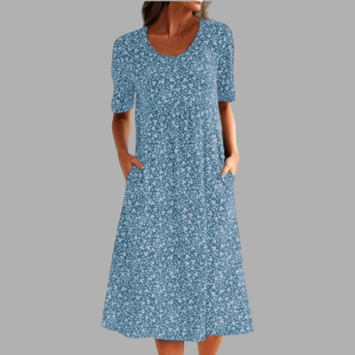 Comfortable women's midi dress with a stylish print. A versatile choice for summer fashion & spring style.